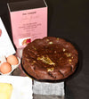 Editorial photo ofFlourless Dark Chocolate Gold Leaf Cake Kit